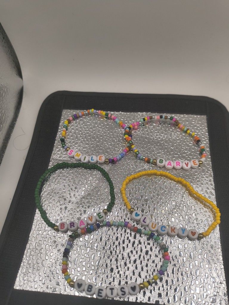 Friendship Bracelet Beautiful Colors 5 Of them all yours for decent price