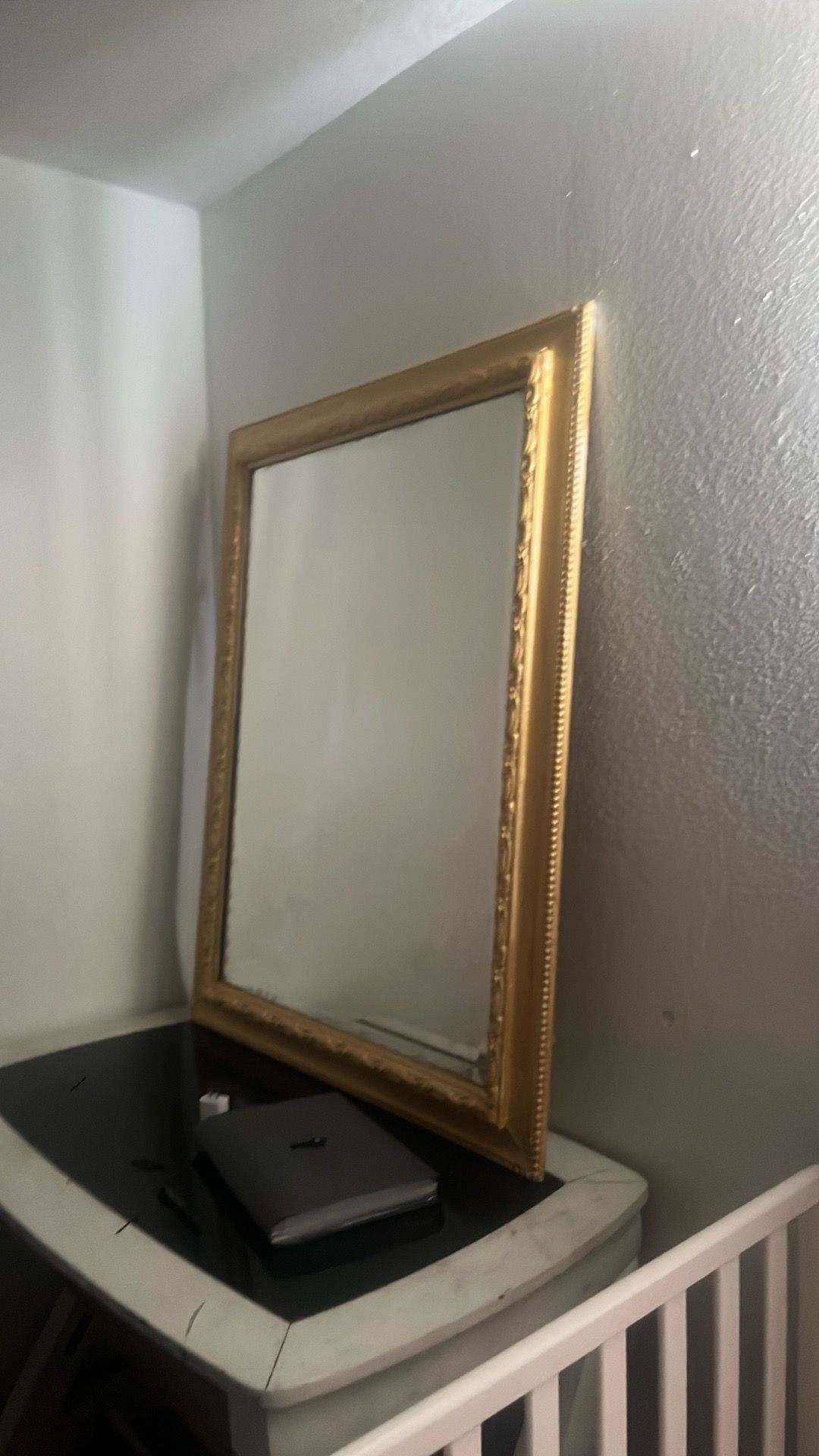 Big gold painted mirror