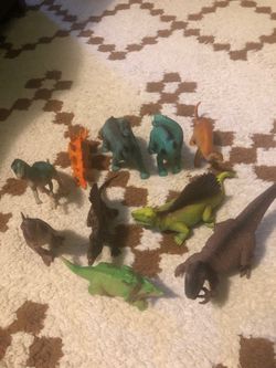 small plastic dinosaurs