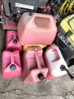 4  Gas Cans. Two Is Two And A Half Gallon Two Is 5 Gallon