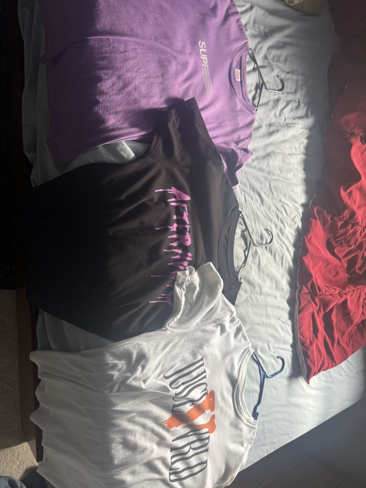 2 Vlone, 1 Supreme Tee, 1 North Face Nuptse 