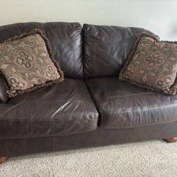 Living Spaces Leather Loveseat