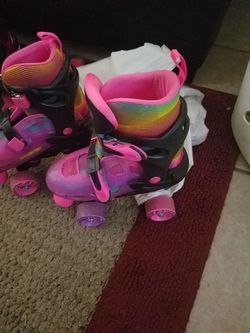 Girl skates with roller blade attachment
