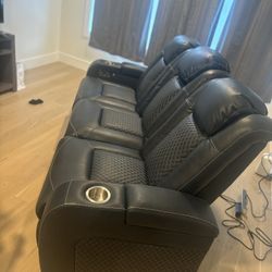 BRAND NEW RECLINING/charging Couch
