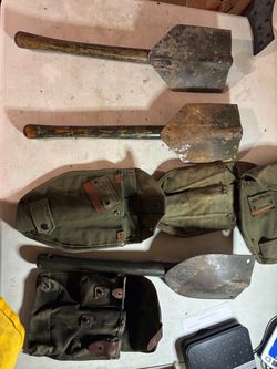 3 World War Two trenching shovels with sheaths and an extra pouch