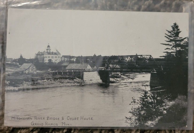 Mississippi river bridge and courthouse grand rapids post