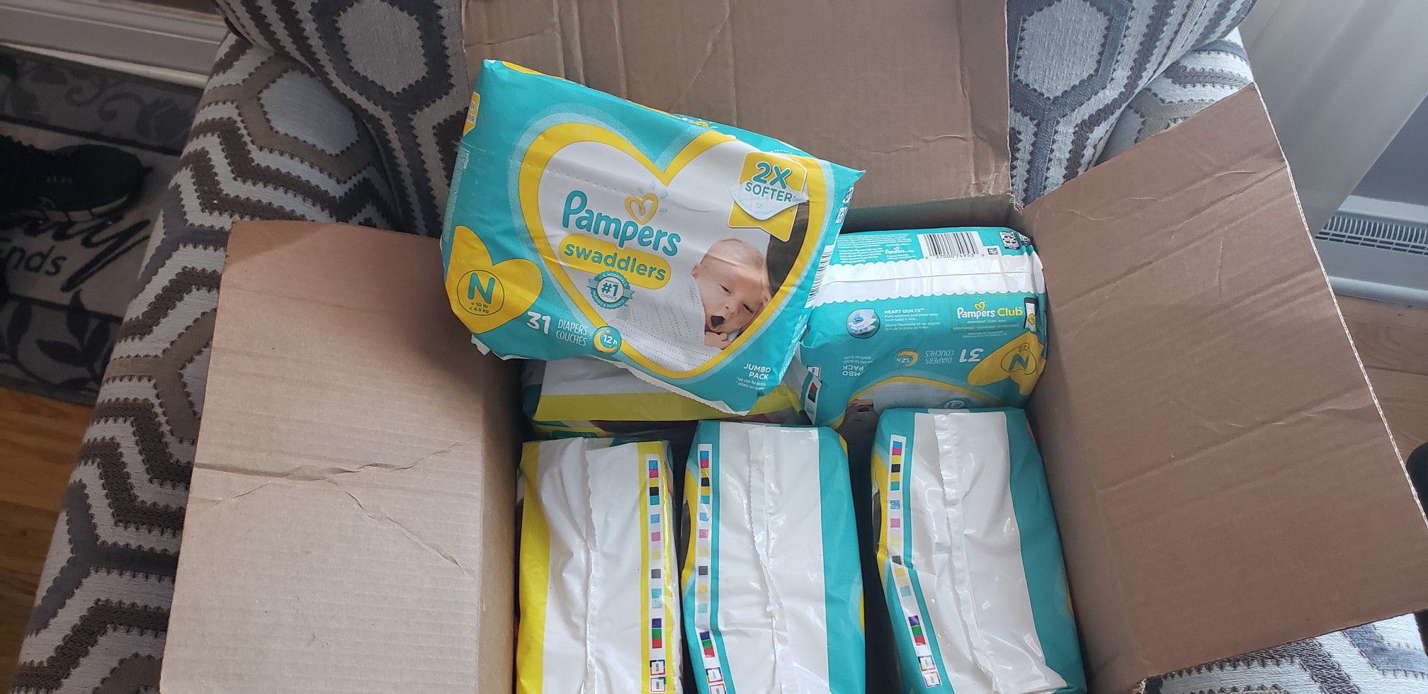 Newborn pampers diapers and pamper diapers size 1