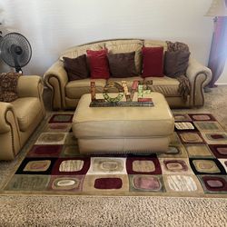 Couch , Chair , Ottoman, Pillows, Throws , Rug 