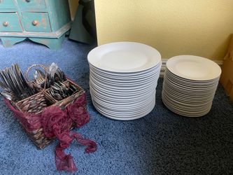 2 Dozen  place settings – porcelain plates and stainless flatware