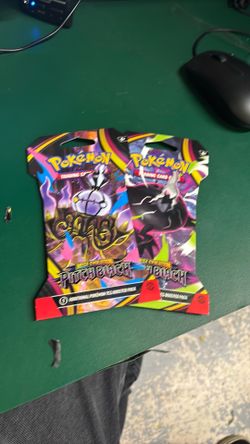 Pitch black Pokémon card packs