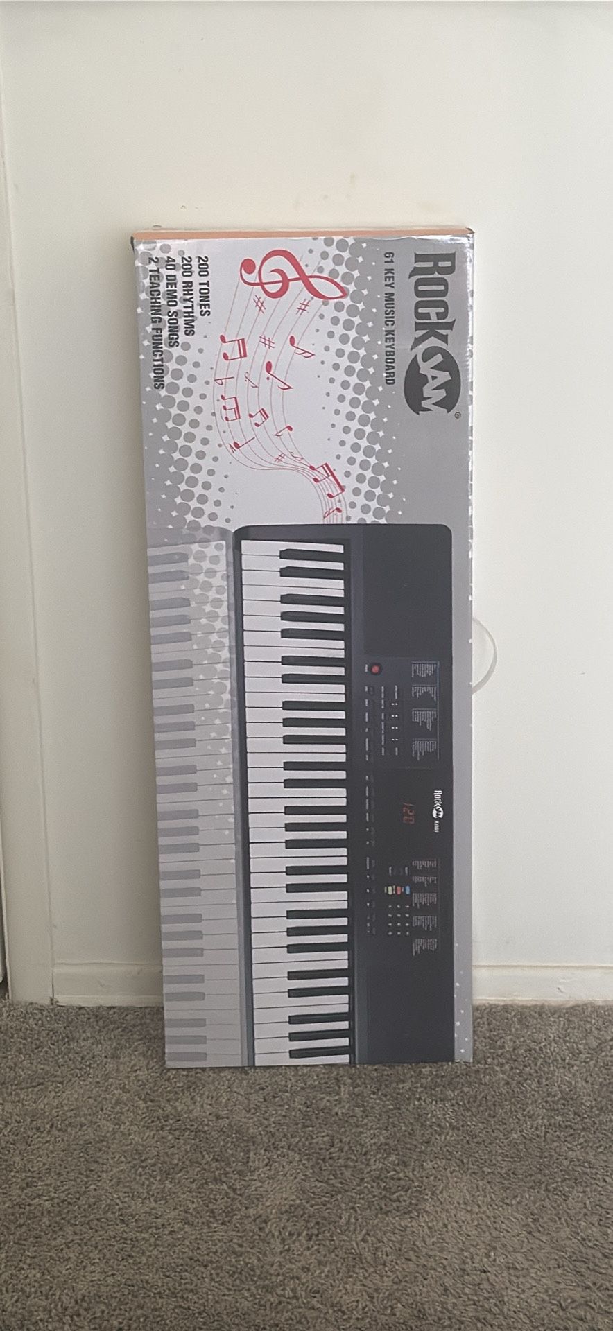 RockJam Compact 61 Key Keyboard with Sheet Music Stand, Power Supply, Piano Note Stickers & Simply P