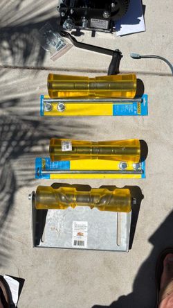 Rollers for boat trailers