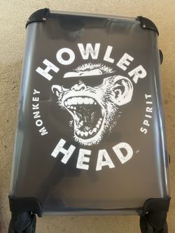 Howler Head whisky carry on suitcase