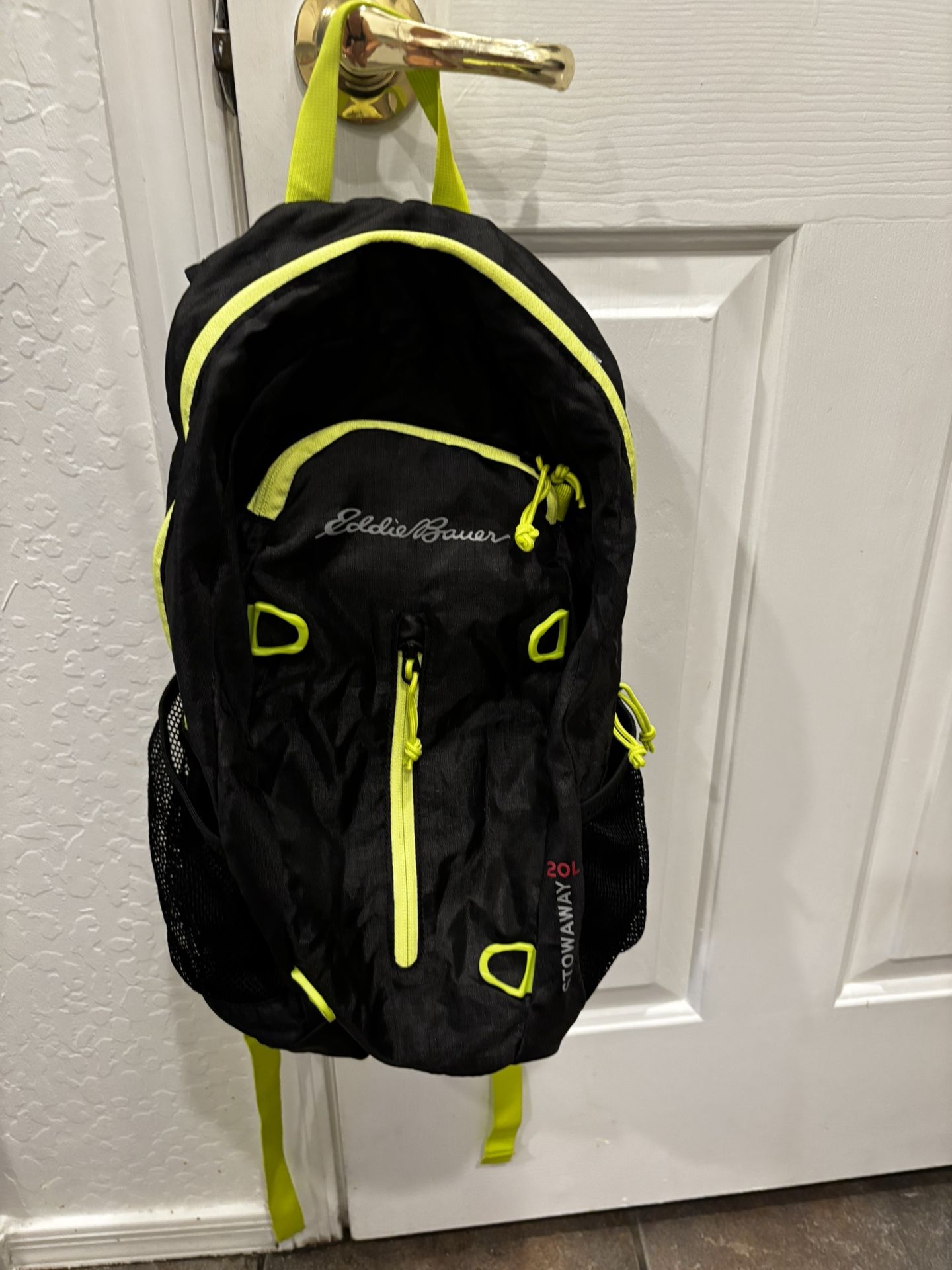Eddie Bauer Brand New Stowaway Lightweight Backpack and black and lime green color