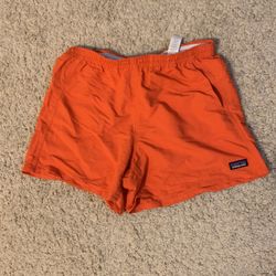 Patagonia, orange shorts