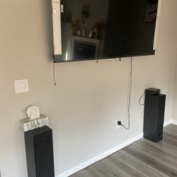 75” 4K Hisense Smart TV + Tower Speakers + Bluetooth Amp
