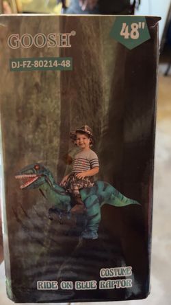 Dinosaur costume ride blue raptor inflatable.