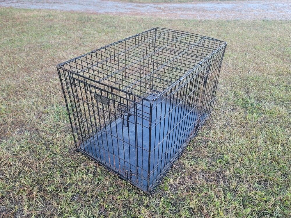Double Door Folding Dog Crate Measures 36"L x 22"W x 24"H 