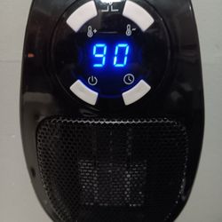 Mini Electric Heater W/fan. Walloutlet
