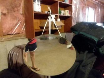 Oval over mirror that hangs