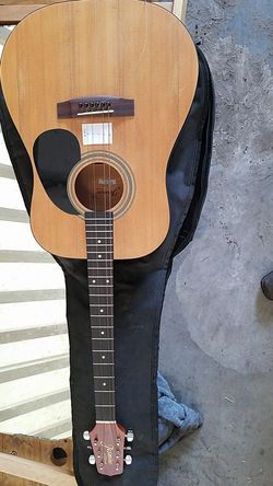 Jasmine acoustic guitar
