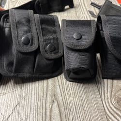 tactical security belt woth various pouches 