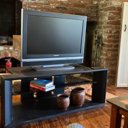 TVStand With Adjustable Glass ShelfThis 