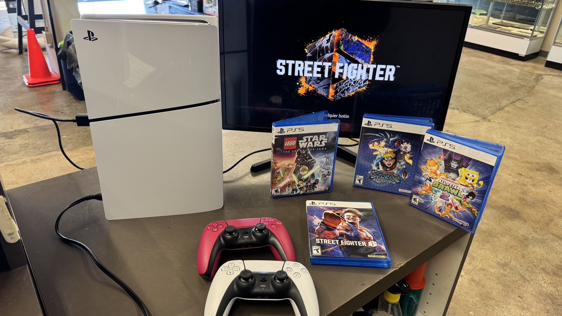 Sony PS5 Slim disc version 2 controllers 4 games nothing sold separate TV NOT included pick in Tacoma FIRM PRICE