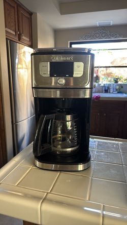 Coffee maker with grinder