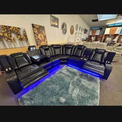 Black leather modern power reclining sectional sofa