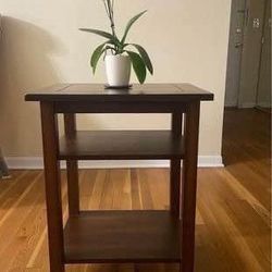 Wooden Table with two shelves, Cherry , good for office and house. Very good condition like new. High Quality Solid Wood, Width: 20.5” Height: 26” Dep