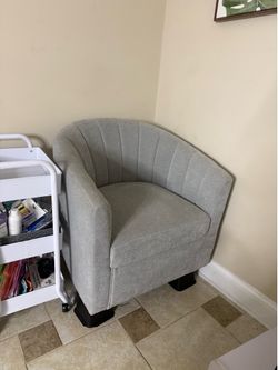 Grey barrel chair