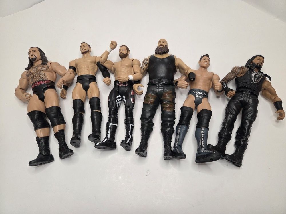 WWE Action Figure Lot – Roman Reigns, Rusev, Braun Strowman & More (8 Figures)