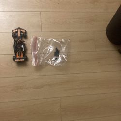 A Formula One car, McLaren F1 broken a little pieces got missing in the bag there’s still some