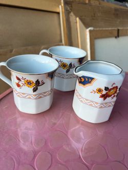 Sugar and coffee cups set4 dlrs