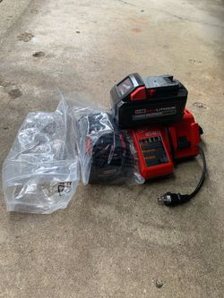2 Milwaukee m18 xc 6.0 high output batteries and charger brand new.
