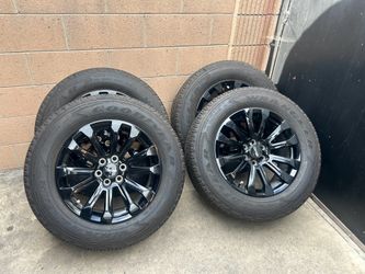 GMC 265/60R18 tires with Rims