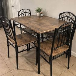 Dinning table set (new in the box)
