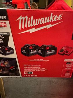Have this milwaukee with charger and 2 batteries sells for 299 brand new letting it go for $200