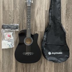 Acoustic guitar with kit included