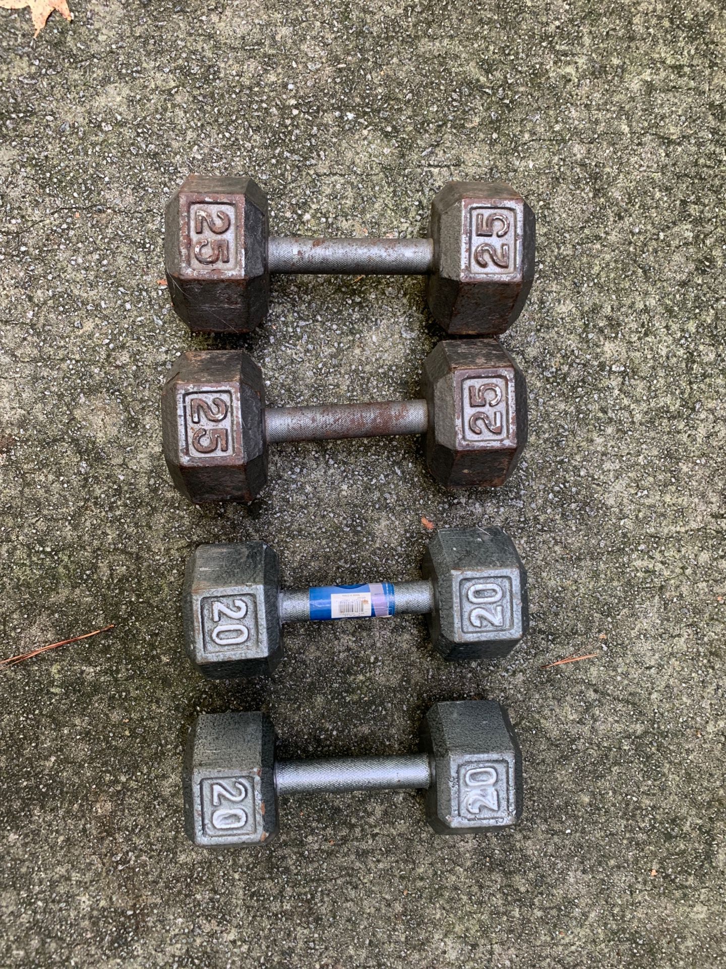 Pairs of 25 and 20 lb dumbbells