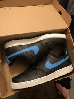 Nikes Black And Blue Sz 12. 75&