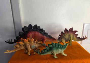 4 Dinosaur Plastic Figures Lot of Stegosaurus mother and baby rare original.