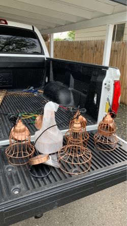 Set of 5 copper light fixtures.
