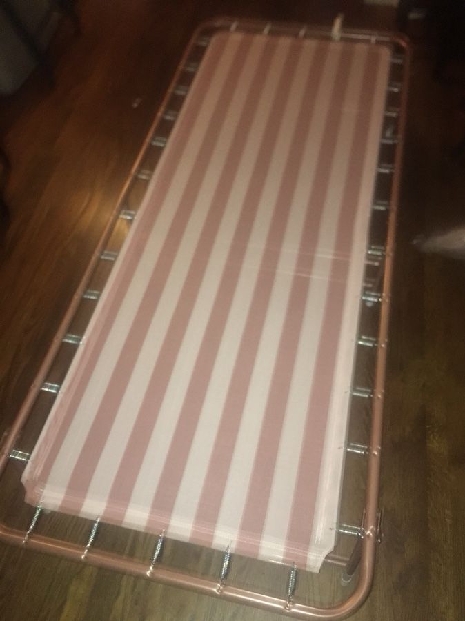 Brand new folding bed (in the box)