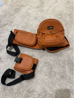 Tushbaby carrier with extender