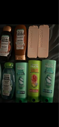 9 bottles of shampoo and conditioner