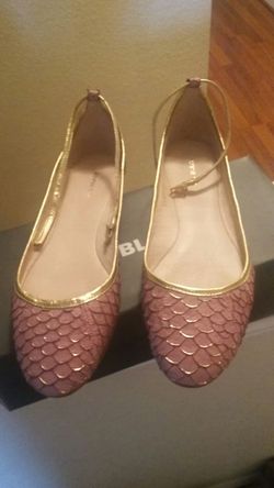 Rose gold flats.
