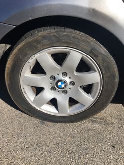 A Pair Of 16” Bmw Wheels With Tires Good Condition