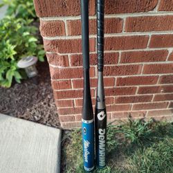 Softball Bats 34".  (2)